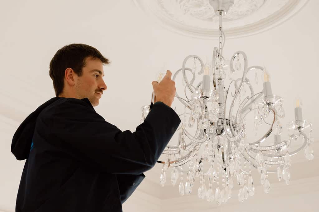stl electrician replacing home lighting led bulbs chandelier